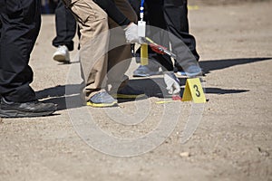 Forensic team searh and evidence marker in crime scene training