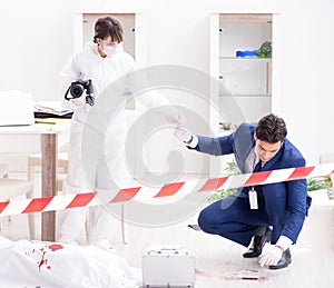 Forensics investigator at the scene of office crime