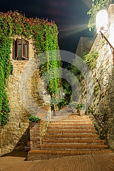 A foreshortening in San Gimignano in Tuscany by night