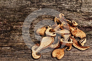 Forest dried edible mushrooms in a linen sack