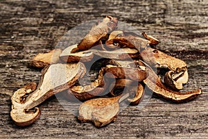 Forest dried edible mushrooms in a linen sack