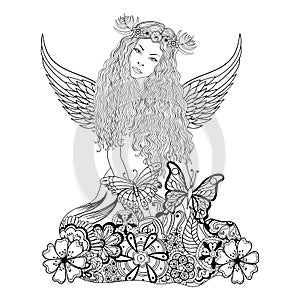 Forest fairy with wings and wreath on the head, young beautiful