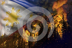 Forest fire fight concept, natural disaster - heavy fire in the woods on Philippines flag background - 3D illustration of nature