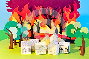 Forest fire near a village, paper cut, paper art