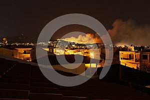 Forest Fire at Night.Wildfire burning forest trees in the mountain.Wildfires caused by humans