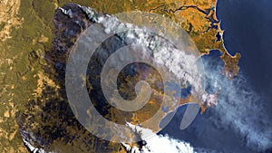 Forest fires in Australia, a view from space. Environmental problems, a large fire in the forest,