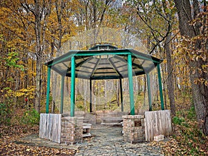 Forest gazebo captured surrounded by autumn foliage