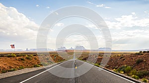 Forest Gump Point with Navajo American flag - Monument Valley scenic panorama on the road - Arizona, AZ