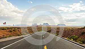 Forest Gump Point with Navajo American flag - Monument Valley scenic panorama on the road - Arizona, AZ