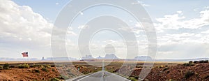 Forest Gump Point with Navajo American flag - Monument Valley scenic panorama on the road - Arizona, AZ