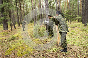 Forest inspectors work in the forest.