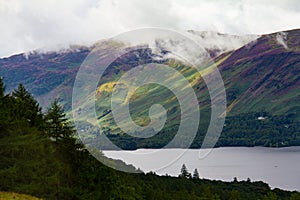 Forest and Lake Derwent Water in Keswick, Lake District, UK