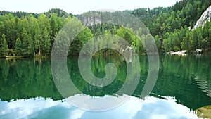 Forest lake at the Teplice Adrshpach rocks