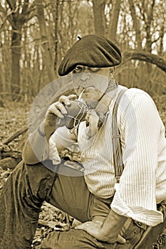 Forest man drinking yerba mate