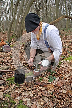 Forest man preparing yerba mate