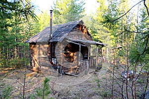 Forest shelter cabin for hunters in the Siberian taiga.