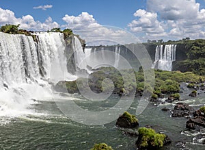 Forest, waterfalls and river with rocks