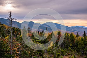 Forested Mountain landscape at dusk, Stunning fall colors.