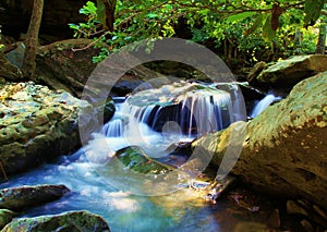 Forested Rocky Natural Spring Waterfall