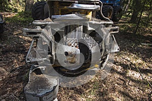 Forestry harvester during a stoppage among trees