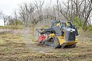 Forestry Mulcher Clearing Weeds, Rear View