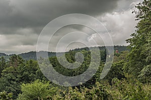 Forests near Kostelni Briza village in summer dark cloudy day