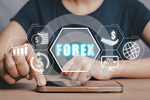 Forex trading, Person using smartphone with Forex icon on VR screen on desk, Online investment. Business, internet and technology