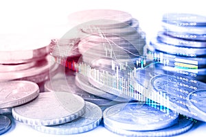 Forex trading and stock market trading with candlestick chart and coins.Financial and investment concept.