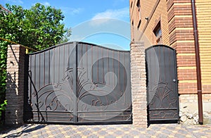 Forged gate and house metal door. Metal Gates - Gates