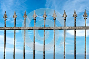 Forged iron fence with arrows