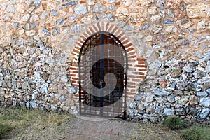 Forged lattice in the archway of Alanya Castle Alanya, Turkey