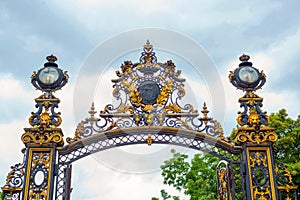Forged metal gates with gilding