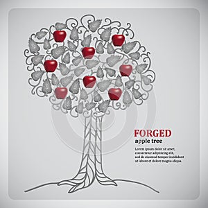 Forged metall tree with red apples