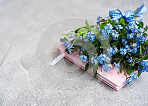 Forget me not flowers and notebook