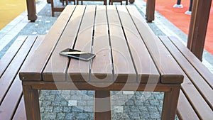 forget smartphone on a park bench, lost smart phone