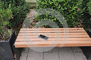 forget smartphone on a park bench, lost smart phone