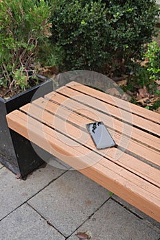 forget smartphone on a park bench, lost smart phone