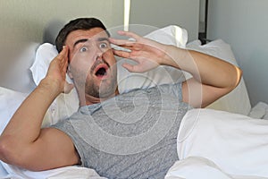 Forgetful man remembering something important photo