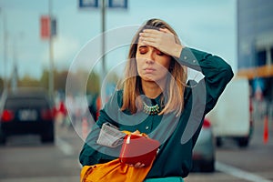 Forgetful Woman Checking her Bag Losing her Money photo