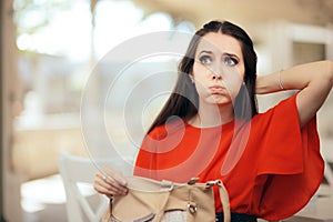 Forgetful Woman Checking Her Messy Purse