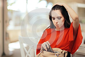 Forgetful Woman Checking Her Messy Purse