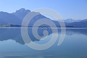 Forggensee with SÃ¤uling in AllgÃ¤u in the silence of the morning