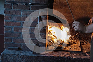 Forging Iron in the Fire of a Blacksmith Shop