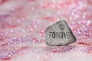 Forgive engrave on stone photo