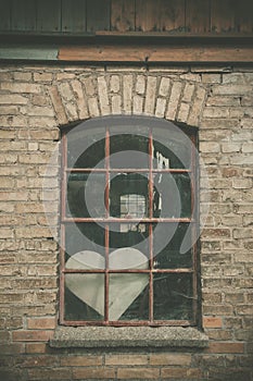 Forgotten love heart in a window