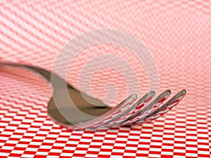 Fork with checkered pattern background