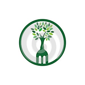 Fork hand tree vector logo design. Restaurant and farming logo concept.