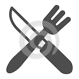 Fork and knife crossed, eating utensils solid icon, catering concept, cutlery vector sign on white background, glyph