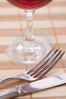 Fork and knife on placemat