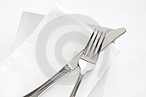 Fork, Knife and White Napkin Table Setting